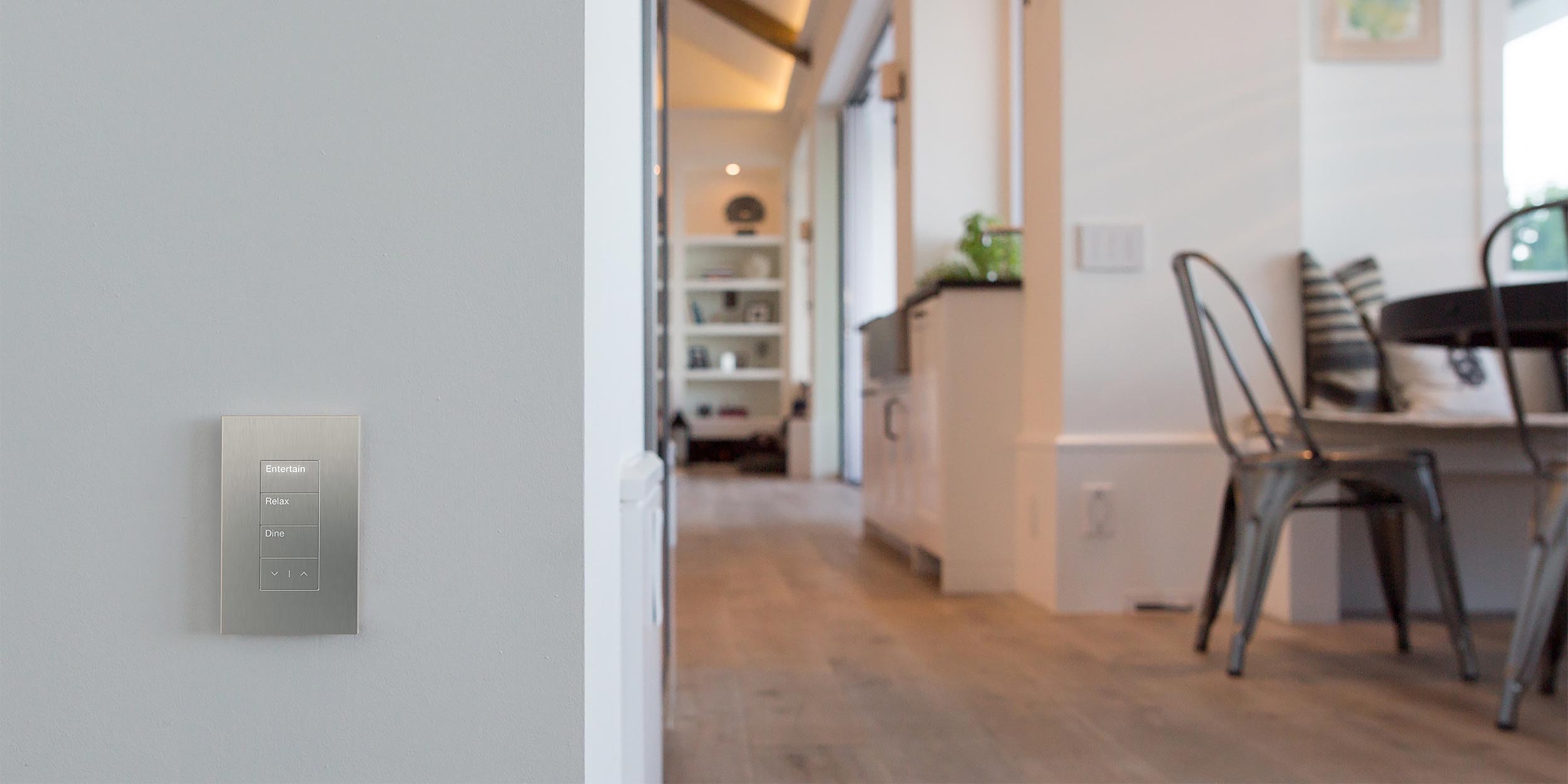 Sleek smart lighting control panel in a contemporary home setting