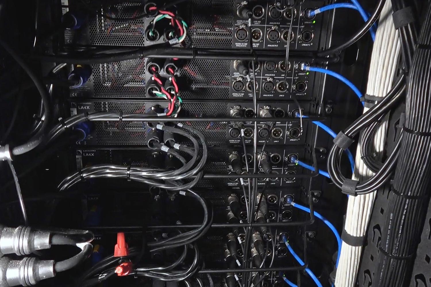 Close-up of organized cables and wiring in a server rack