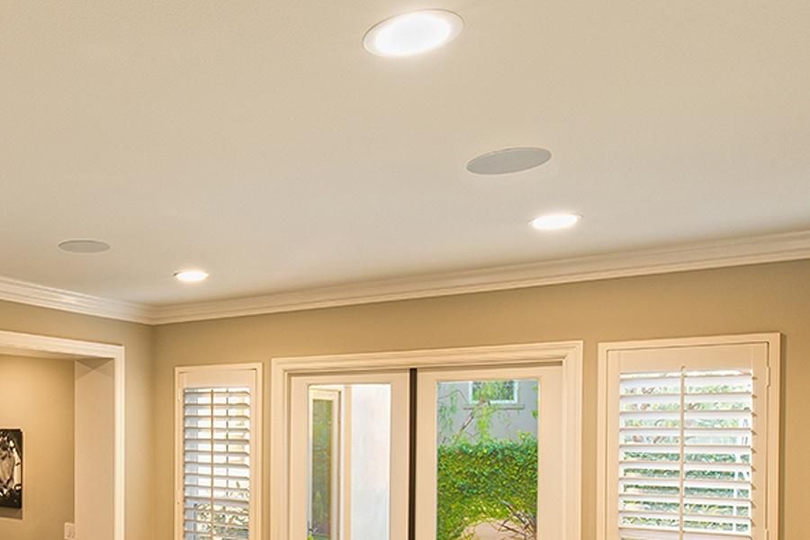 Ceiling with round recessed lights in a living room