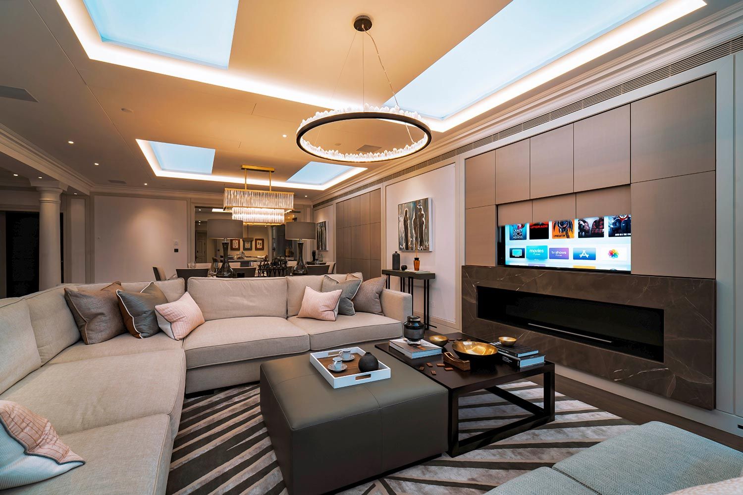 Luxurious living room with a hidden TV in a wall panel