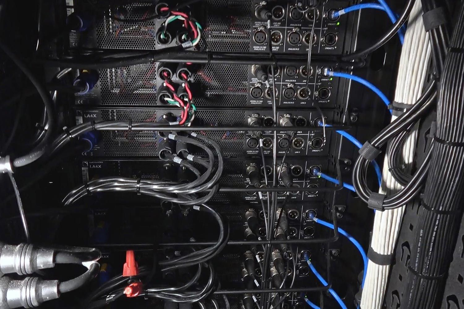 Close-up of organized cables and wiring in a server rack
