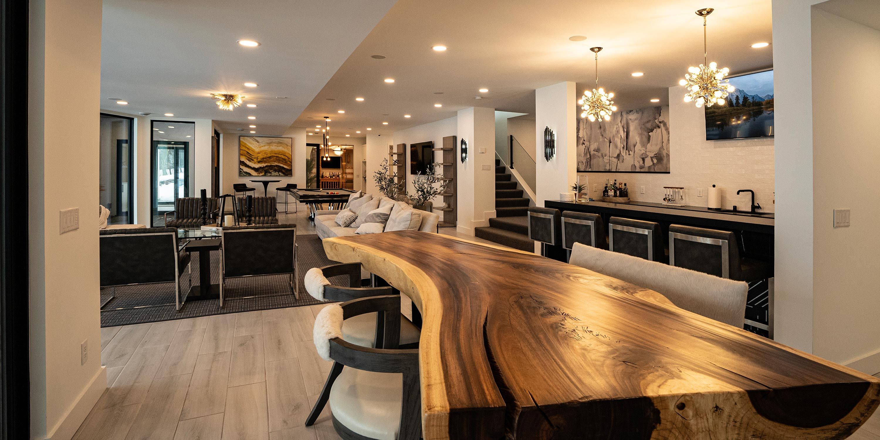 Open-concept living space with a wooden dining table